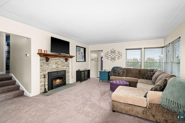 2025 E 8th St, Duluth, MN 55812 - carpeted living area featuring a stone fireplace, a textured ceiling, and stairs