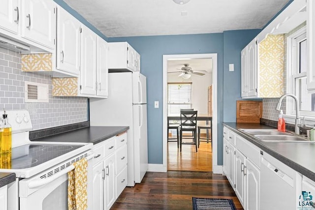 2025 E 8th St, Duluth, MN 55812 - kitchen with white appliances, dark wood-style flooring, ceiling fan, and white cabinetry