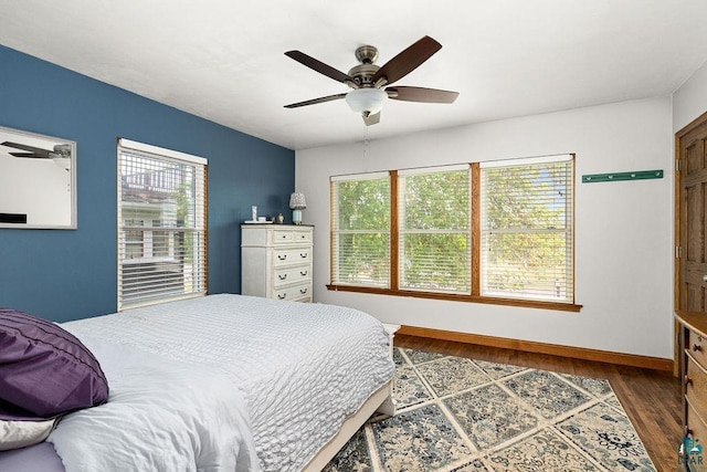 2025 E 8th St, Duluth, MN 55812 - bedroom featuring multiple windows, dark wood-style flooring, and a ceiling fan