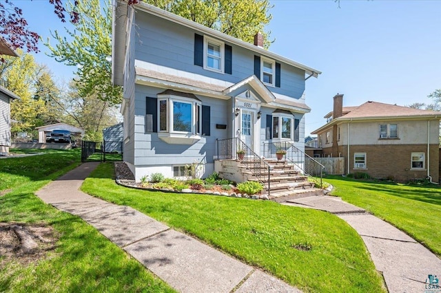 5521 Huntington St, Duluth, MN 55807 - view of front of property with a chimney