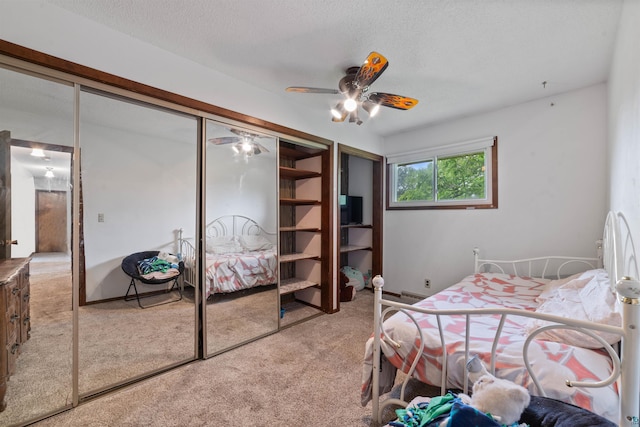 5510 Thompson Hill Rd, Duluth, MN 55810 - carpeted bedroom featuring a ceiling fan, a textured ceiling, and a closet
