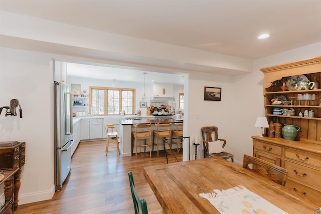 27 Ryan Ln, Esko, MN 55733 - dining area with light wood-style floors and recessed lighting