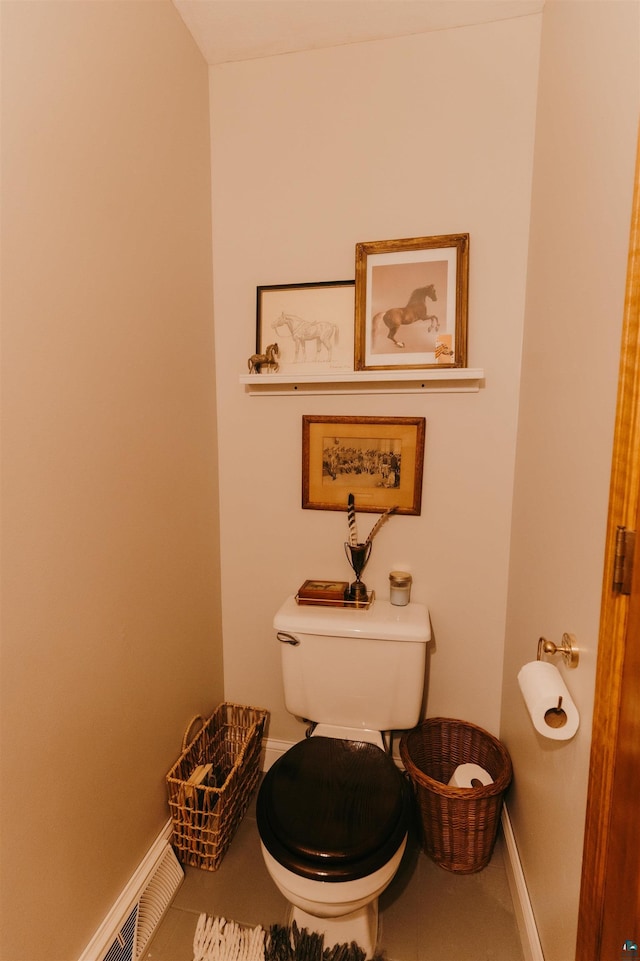27 Ryan Ln, Esko, MN 55733 - half bathroom featuring toilet and tile patterned flooring