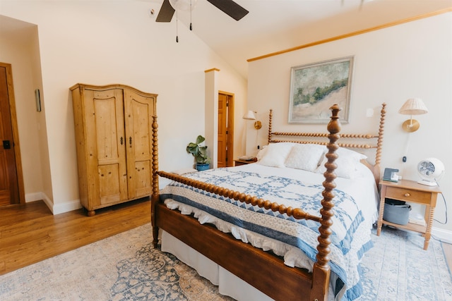 27 Ryan Ln, Esko, MN 55733 - bedroom featuring light wood-style flooring, lofted ceiling, and a ceiling fan