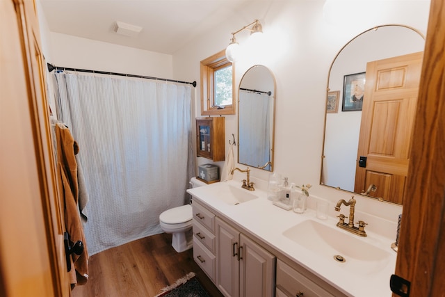 27 Ryan Ln, Esko, MN 55733 - full bathroom with double vanity and wood finished floors