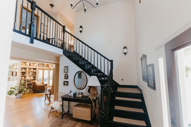 27 Ryan Ln, Esko, MN 55733 - staircase with a towering ceiling and wood finished floors