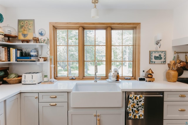 27 Ryan Ln, Esko, MN 55733 - kitchen featuring dishwashing machine, healthy amount of natural light, light countertops, and open shelves