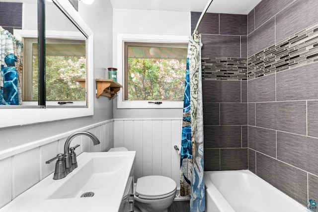 4750 Morris Thomas Rd, Hermantown, MN 55811 - bathroom with wainscoting, vanity, and shower / tub combo with curtain