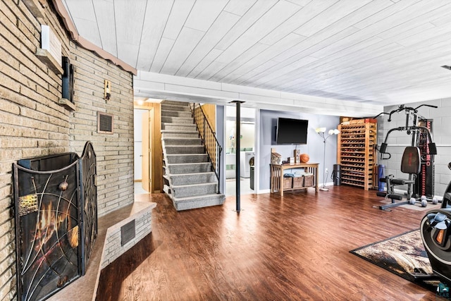 4750 Morris Thomas Rd, Hermantown, MN 55811 - exercise area with washer / dryer, wood finished floors, and wood ceiling