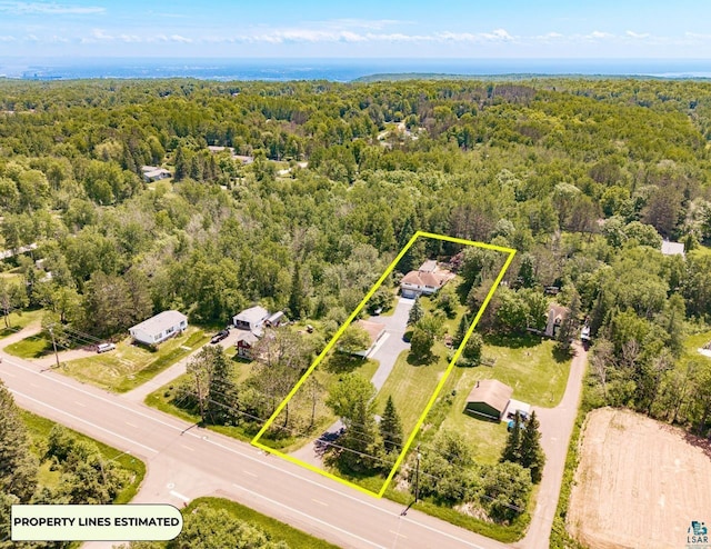 4750 Morris Thomas Rd, Hermantown, MN 55811 - aerial overview of property's location with a heavily wooded area and property parcel outlined
