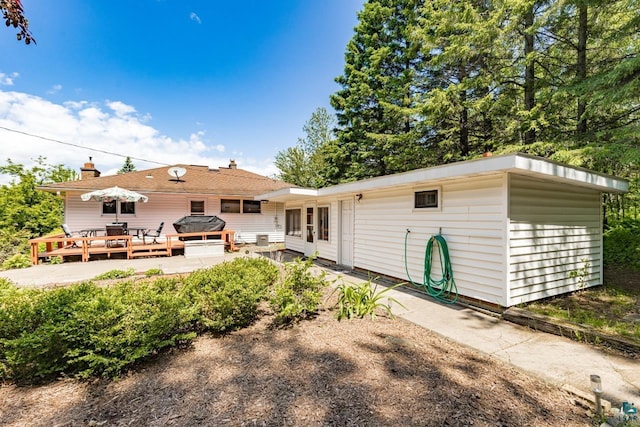 4750 Morris Thomas Rd, Hermantown, MN 55811 - back of property with a deck