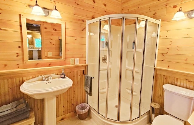 2357 Retreat Lodge Rd, Cook, MN 55723 - full bath featuring wooden walls and a shower stall