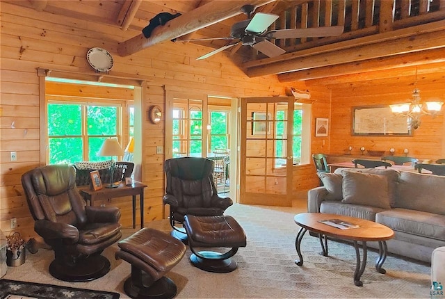 2357 Retreat Lodge Rd, Cook, MN 55723 - living area with wood walls, ceiling fan, and a chandelier