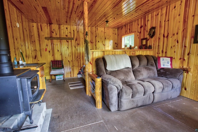 4194 First Lake Rd, Ely, MN 55731 - living area with a wood stove and wooden walls