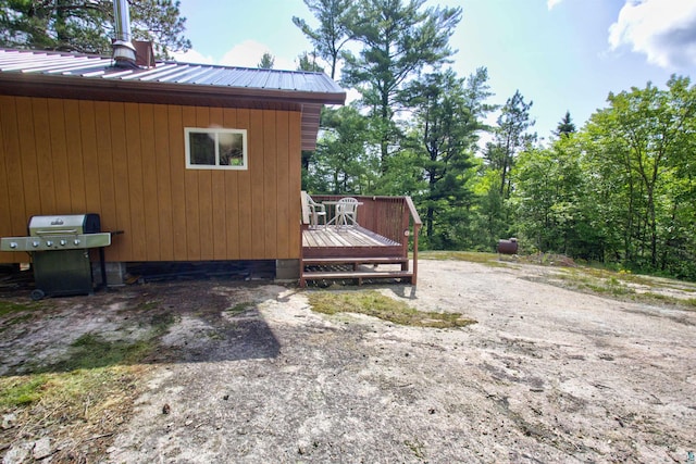 4194 First Lake Rd, Ely, MN 55731 - view of property exterior featuring a wooden deck and a metal roof