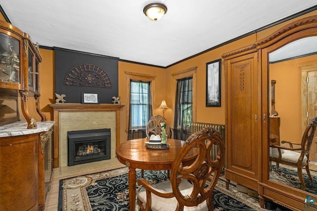 2319 E 4th St, Duluth, MN 55812 - dining space featuring a fireplace and crown molding
