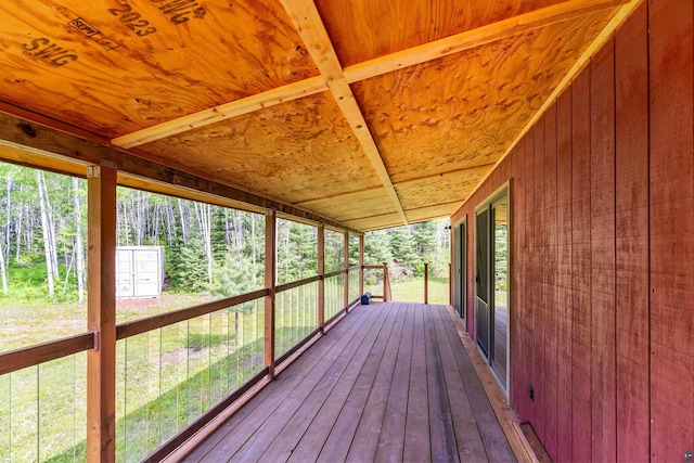 1612 Pequaywan Lake Rd, Ault, MN 55602 - wooden terrace featuring a view of trees