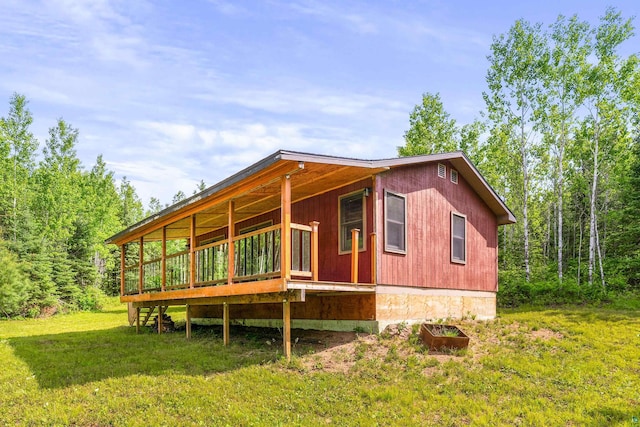 1612 Pequaywan Lake Rd, Ault, MN 55602 - view of property exterior with a lawn