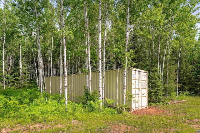 1612 Pequaywan Lake Rd, Ault, MN 55602 - view of outbuilding featuring a water view and a forest view