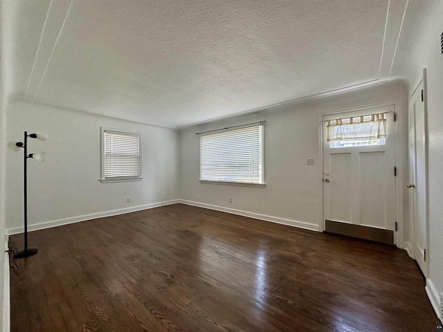 35 E Faribault St, Duluth, MN 55803 - foyer entrance featuring dark wood-style flooring and a textured ceiling