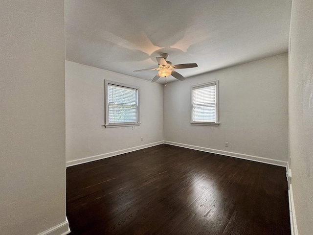 35 E Faribault St, Duluth, MN 55803 - spare room featuring plenty of natural light, ceiling fan, and dark wood-style floors