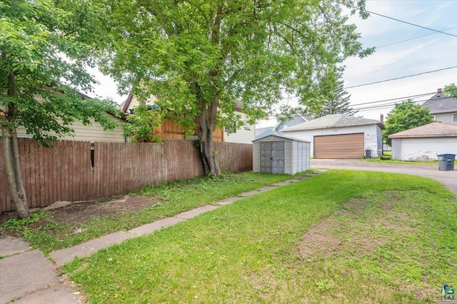 3731 W 2nd St, Duluth, MN 55807 - view of yard with a storage shed and a garage