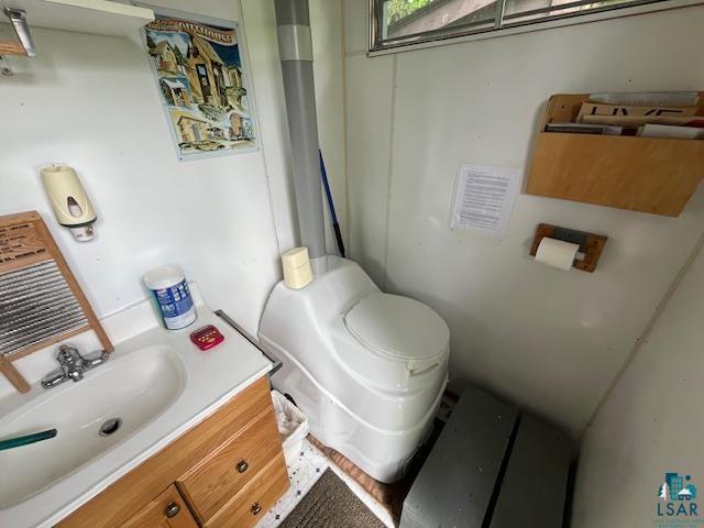 2217 Michael Beach Rd, Zim, MN 55738 - bathroom with toilet and vanity