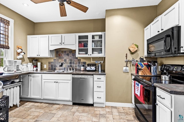 3801 W 5th St, Duluth, MN 55807 - kitchen with black appliances, a ceiling fan, tasteful backsplash, white cabinetry, and dark countertops