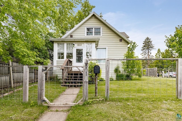 3801 W 5th St, Duluth, MN 55807 - view of front of house with a gate and a fenced front yard