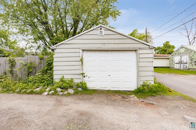 3801 W 5th St, Duluth, MN 55807 - detached garage with dirt driveway