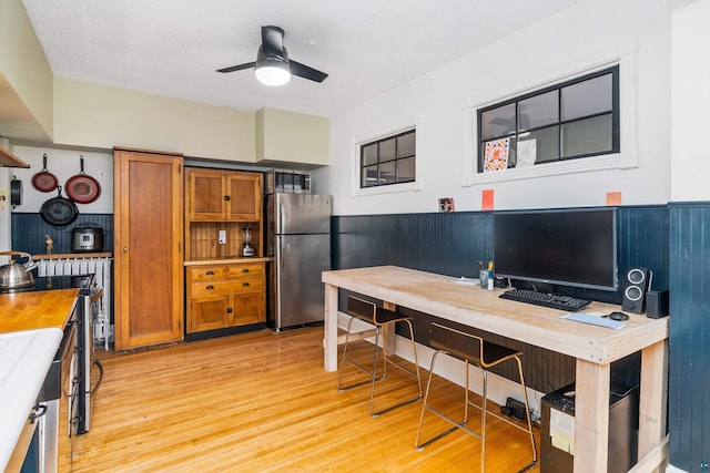 31 W 5th St, Duluth, MN 55806 - office featuring light wood-style flooring, a ceiling fan, and a wainscoted wall