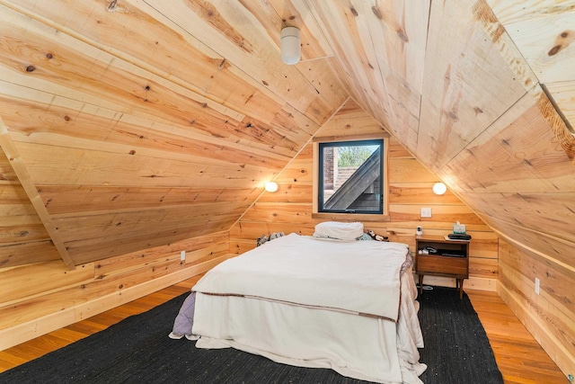 31 W 5th St, Duluth, MN 55806 - bedroom with wood ceiling, wood walls, hardwood / wood-style flooring, and lofted ceiling
