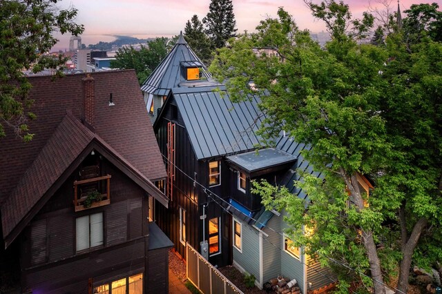 31 W 5th St, Duluth, MN 55806 - back of property at dusk with a standing seam roof and a metal roof