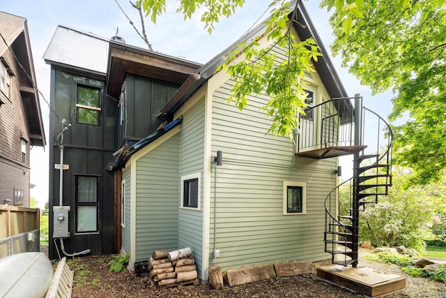 31 W 5th St, Duluth, MN 55806 - back of house featuring stairs and a balcony