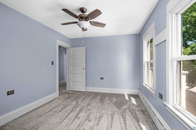 996 85th Ave W, Duluth, MN 55808 - carpeted spare room with ceiling fan and baseboard heating