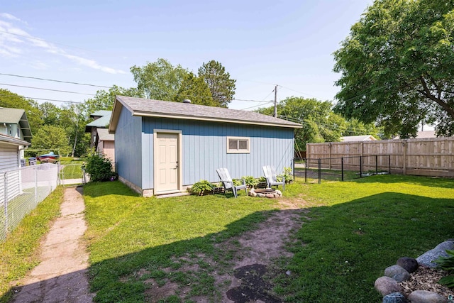 996 85th Ave W, Duluth, MN 55808 - view of outdoor structure featuring a fenced backyard and a gate