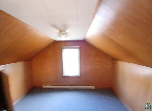112 W 3rd Ave N, Aurora, MN 55705 - bonus room with baseboard heating, vaulted ceiling, and carpet