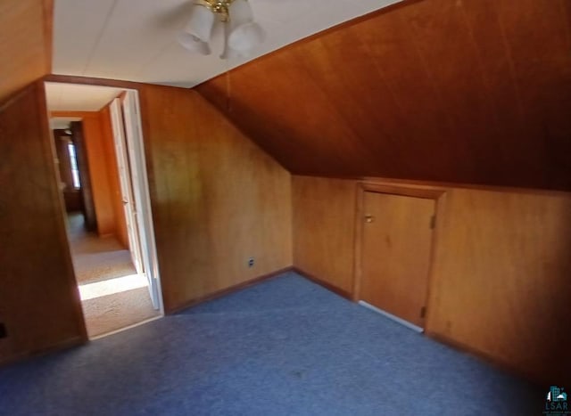 112 W 3rd Ave N, Aurora, MN 55705 - additional living space with lofted ceiling, a ceiling fan, and carpet