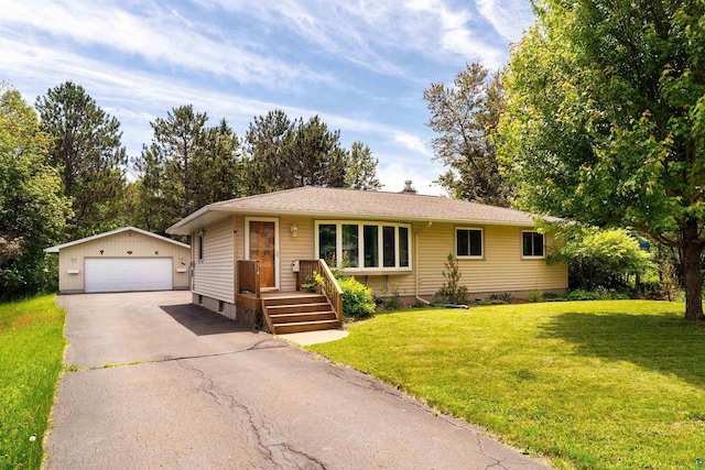 318 Marshall St, Duluth, MN 55803 - view of front facade with an outbuilding, a garage, a front yard, and a chimney