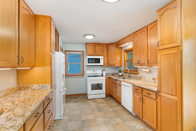 318 Marshall St, Duluth, MN 55803 - kitchen with white appliances and light stone countertops