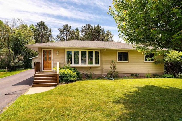 318 Marshall St, Duluth, MN 55803 - view of front of property with a front lawn, driveway, and roof with shingles