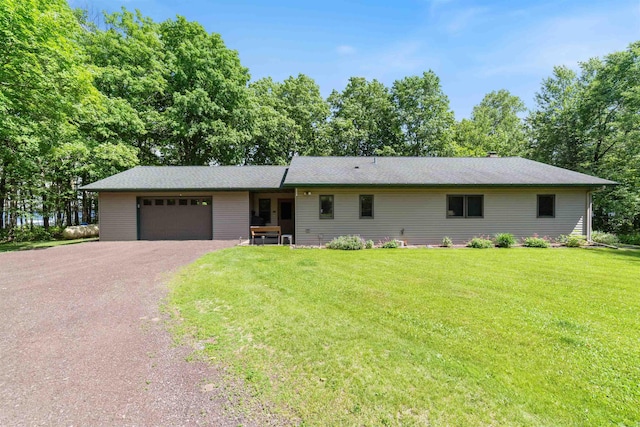 4930 Mini Power Rd, Duluth, MN 55803 - single story home with a garage, driveway, a front lawn, and french doors