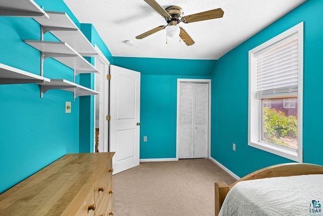 1025 W 3rd St, Duluth, MN 55806 - bedroom featuring carpet flooring, a closet, and a ceiling fan
