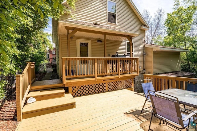 1025 W 3rd St, Duluth, MN 55806 - wooden terrace featuring outdoor dining area