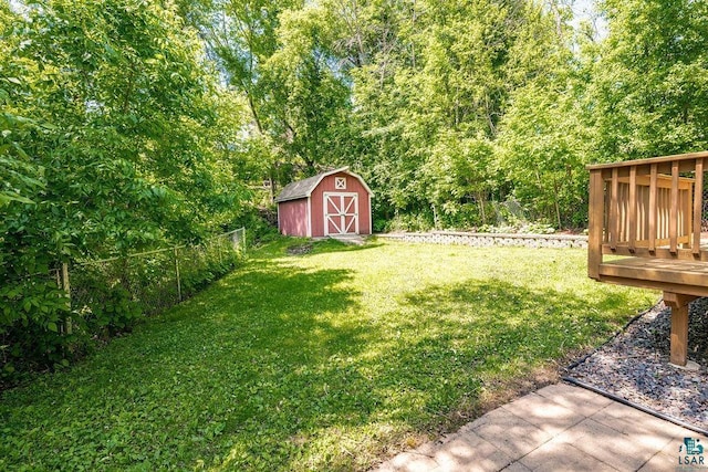 1025 W 3rd St, Duluth, MN 55806 - view of yard featuring a storage unit and a deck