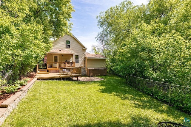 1025 W 3rd St, Duluth, MN 55806 - rear view of property featuring a jacuzzi and a wooden deck