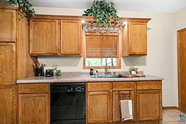 1025 W 3rd St, Duluth, MN 55806 - kitchen featuring dishwasher, light tile patterned flooring, a textured ceiling, and light countertops