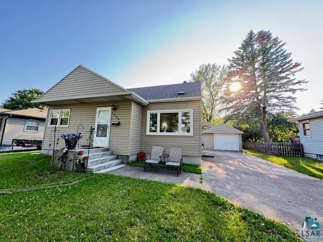 1339 92nd Ave W, Duluth, MN 55808 - bungalow-style house featuring a garage and an outdoor structure