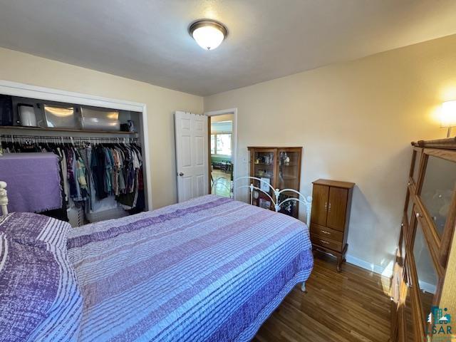 1339 92nd Ave W, Duluth, MN 55808 - bedroom with wood finished floors and a closet