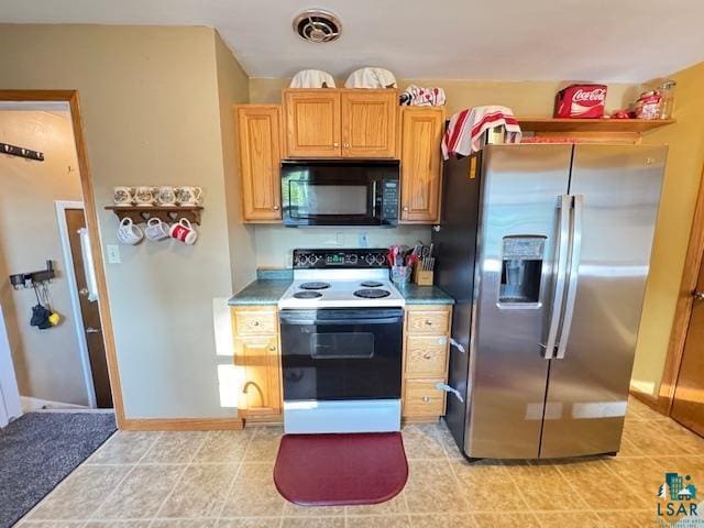 1339 92nd Ave W, Duluth, MN 55808 - kitchen with stainless steel refrigerator with ice dispenser, black microwave, white range with electric stovetop, light countertops, and light tile patterned floors